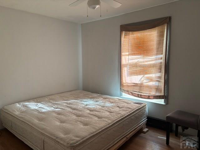 490 A Street Penrose, CO 81240 - Photo 24 of 46 a bedroom with a bed and a window