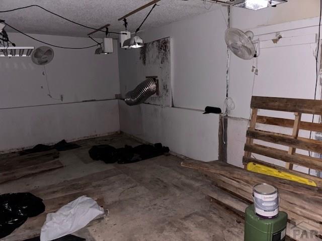 490 A Street Penrose, CO 81240 - Photo 28 of 46 a bedroom with a bed and a window
