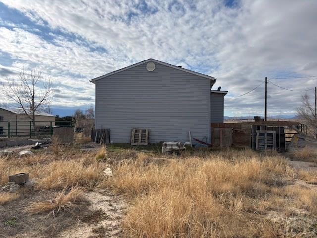 490 A Street Penrose, CO 81240 - Photo 32 of 46 a backyard of a house with barbeque oven