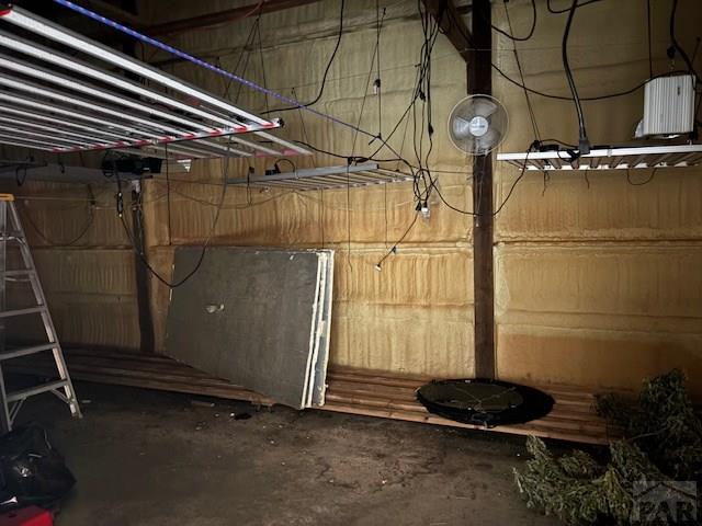 490 A Street Penrose, CO 81240 - Photo 38 of 46 a room with water heater and racks
