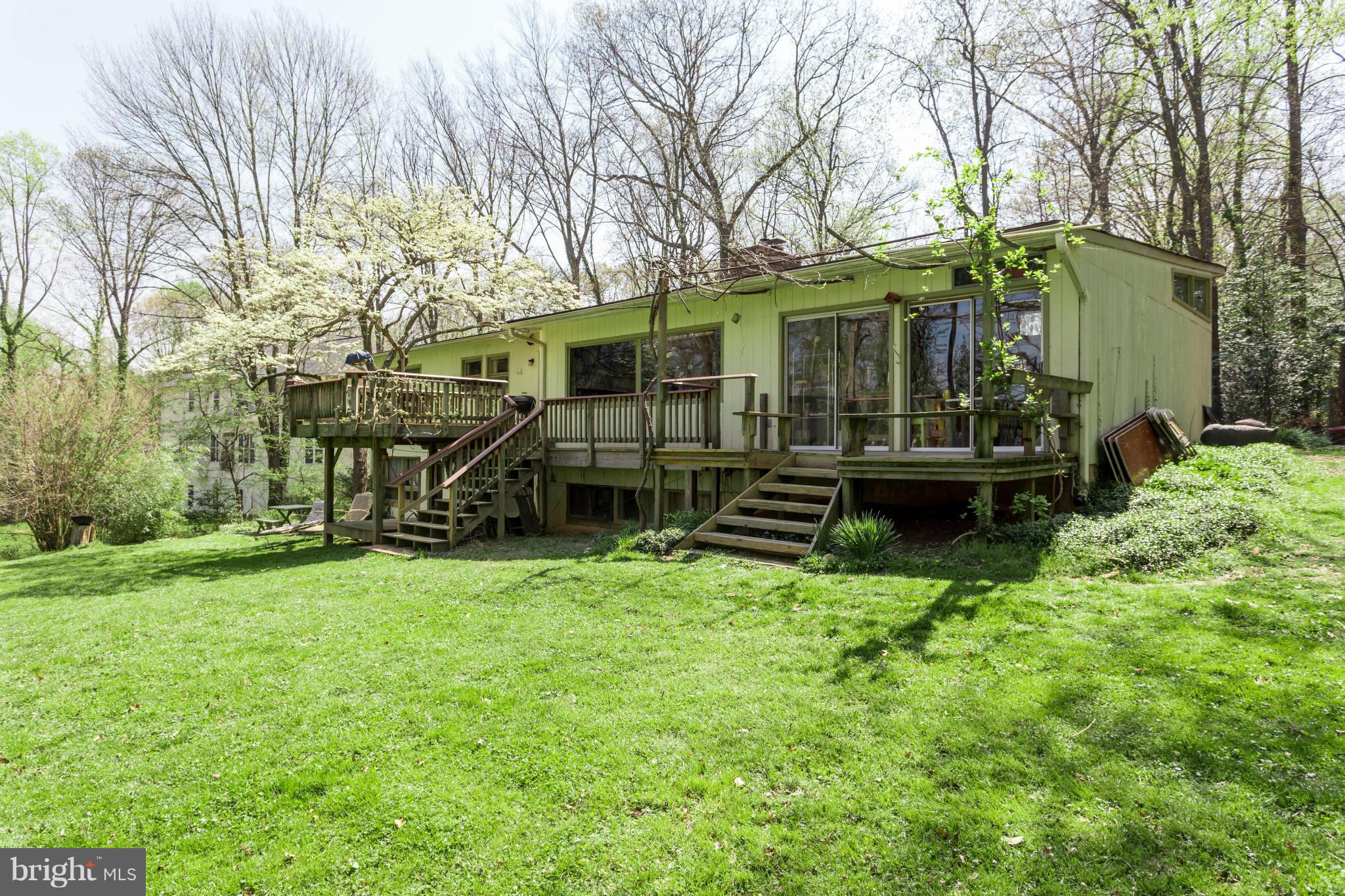 1780 Proffit Road Vienna, VA 22182 - Photo 11 of 21 front view of a house with a yard