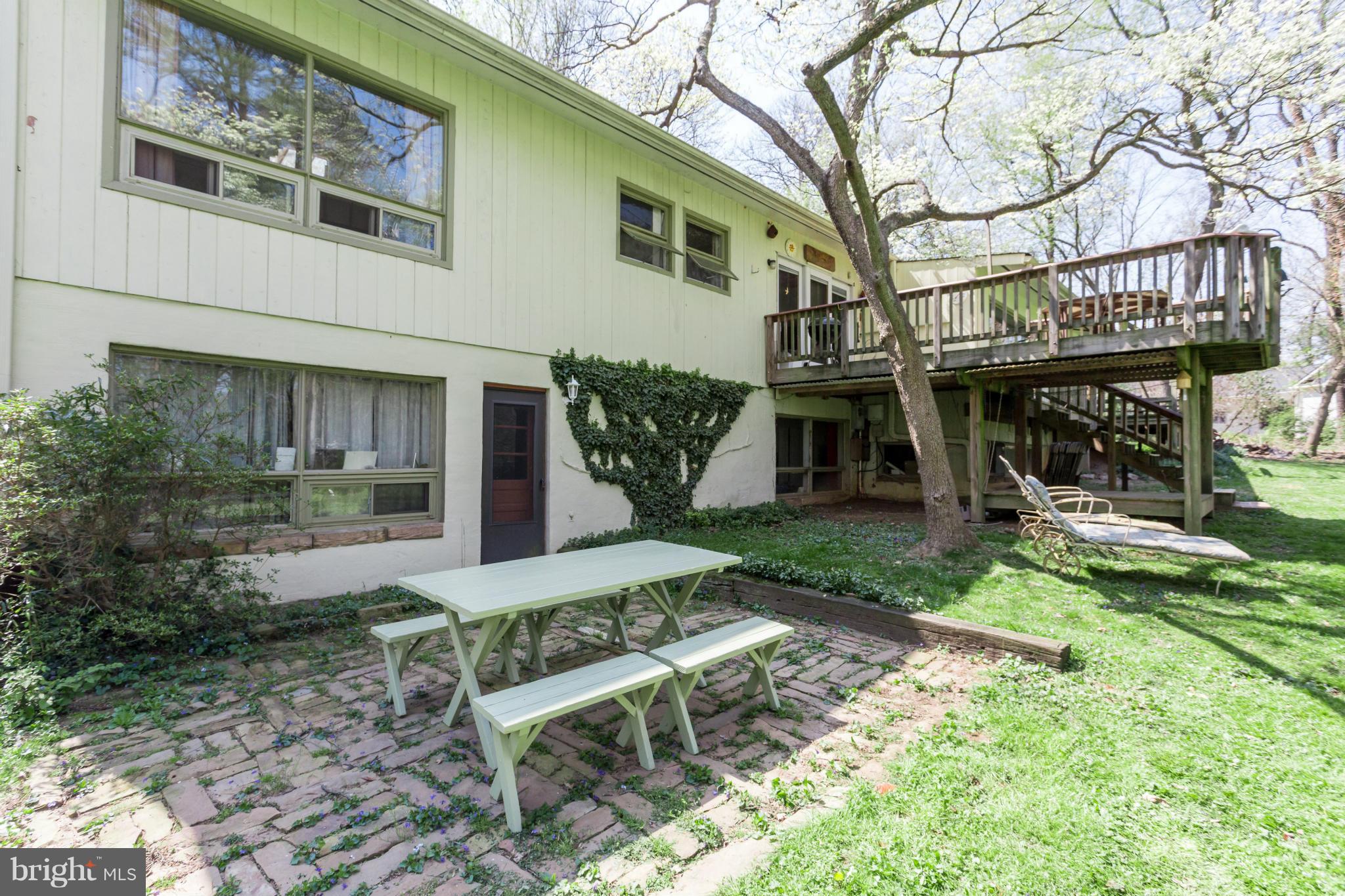 1780 Proffit Road Vienna, VA 22182 - Photo 14 of 21 a front view of a house with garden