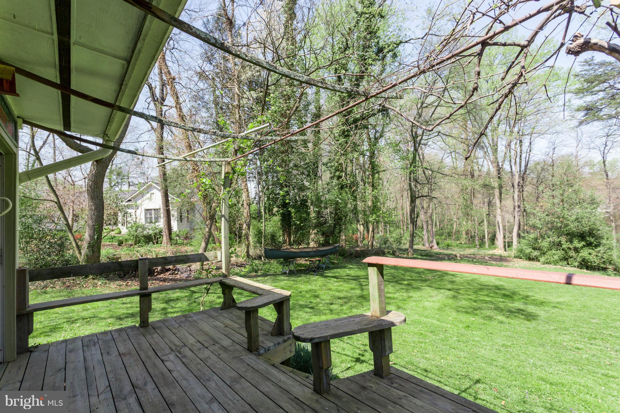 1780 Proffit Road Vienna, VA 22182 - Photo 7 of 21 a view of a bench in a garden