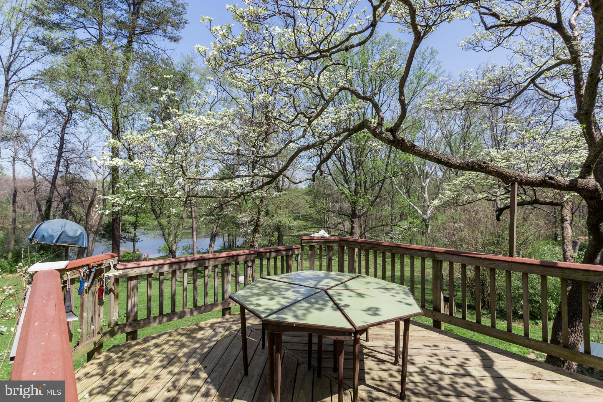 1780 Proffit Road Vienna, VA 22182 - Photo 9 of 21 a view of a balcony with two chairs and a table