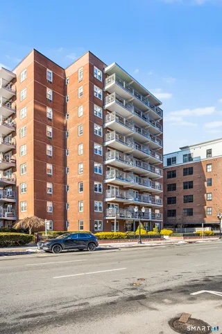 a front view of a building with a road