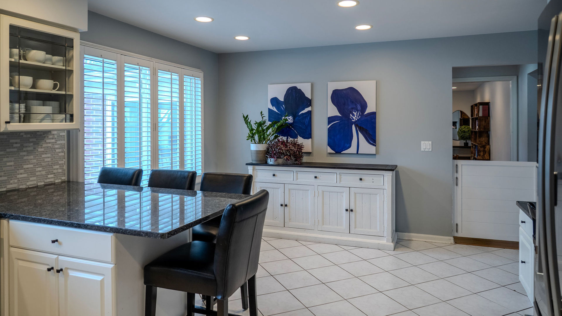 2726 Illinois Road Northbrook, IL 60062 - Photo 7 of 41 a kitchen with a table and chairs