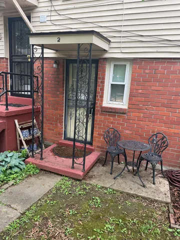 a front view of a house with patio