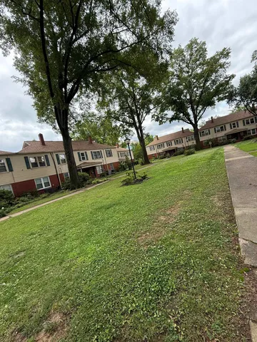 a view of a house with a big yard
