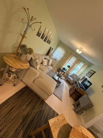 a bathroom with a sink mirror and vanity