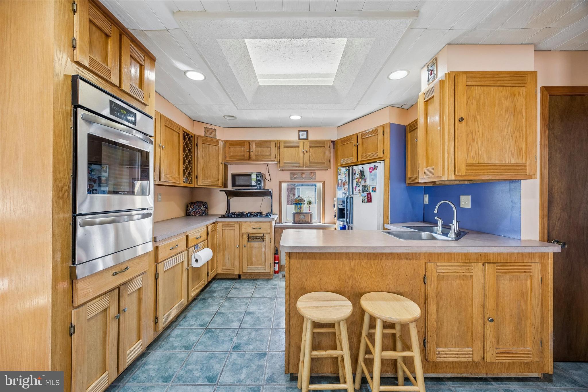 620 Gilbert Road Ridley Park, PA 19078 - Photo 12 of 35 a large kitchen with stainless steel appliances granite countertop a sink and cabinets