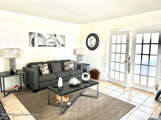941 Croton Road Melbourne, FL 32935 - Photo 12 of 26 a living room with furniture and a window