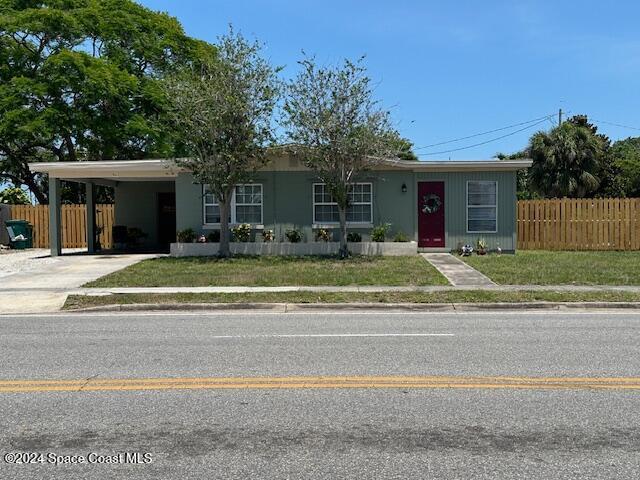 941 Croton Road Melbourne, FL 32935 - Photo 2 of 26 a view of a house with a yard in front of it