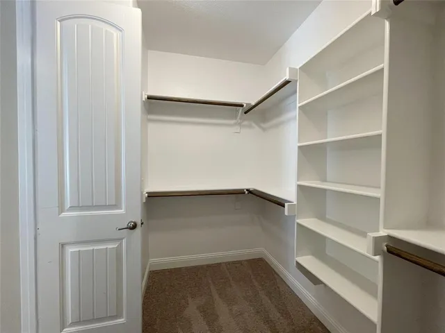 a bathroom with a tub and a sink