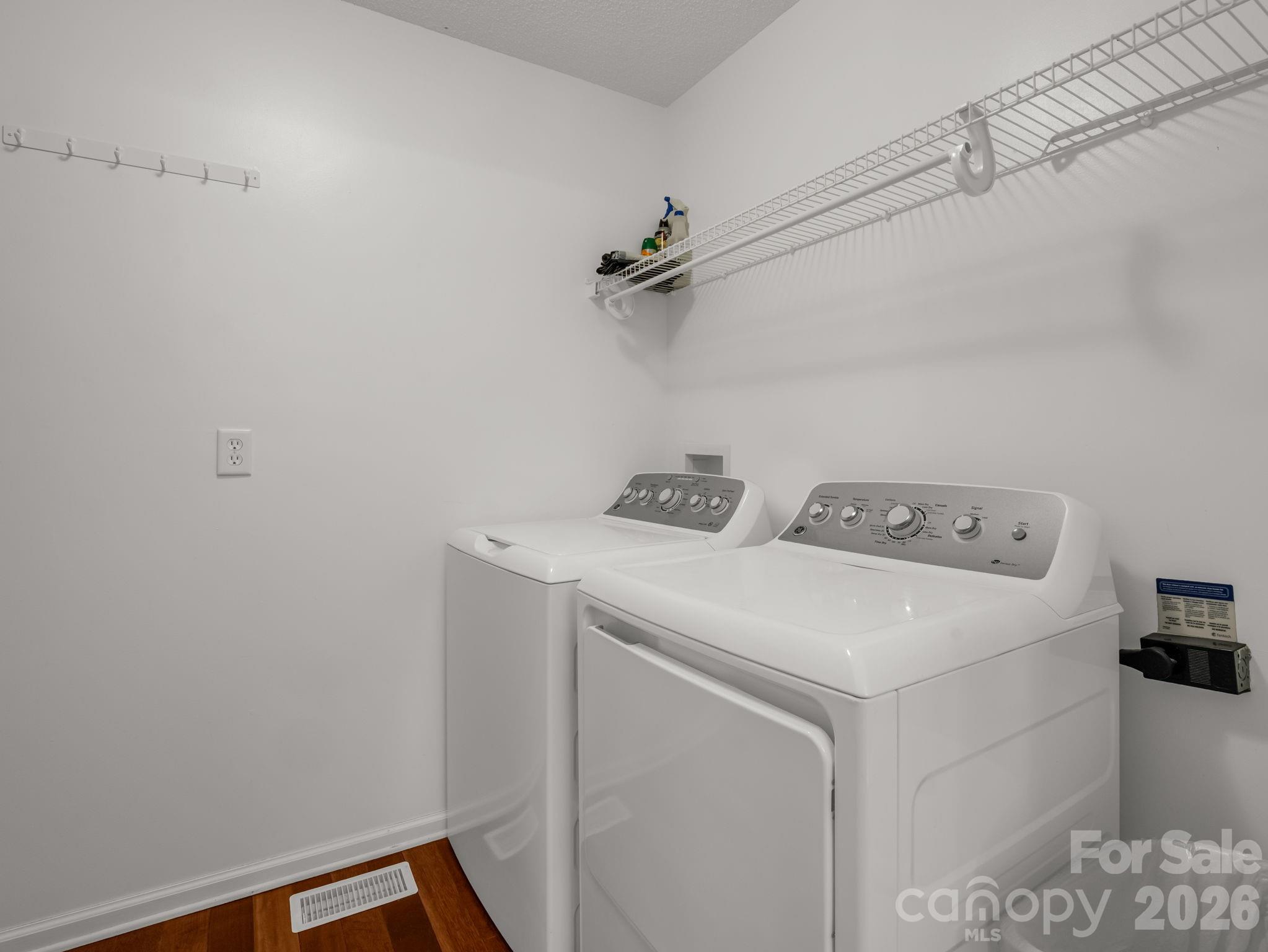 108 Nuthatch Trace Brevard, NC 28712 - Photo 17 of 46 a utility room with dryer and washer