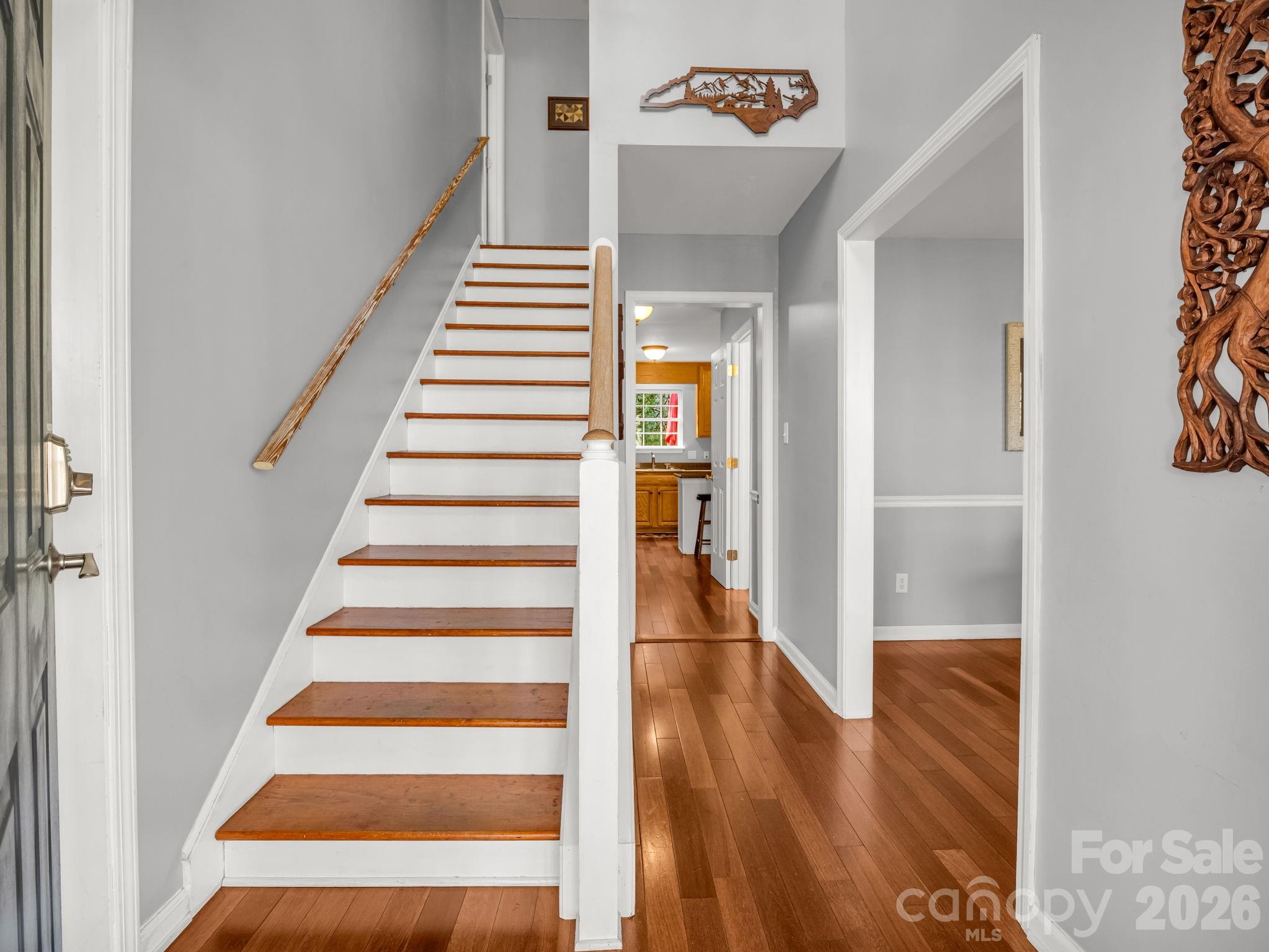 108 Nuthatch Trace Brevard, NC 28712 - Photo 2 of 46 a view of entryway with wooden floor