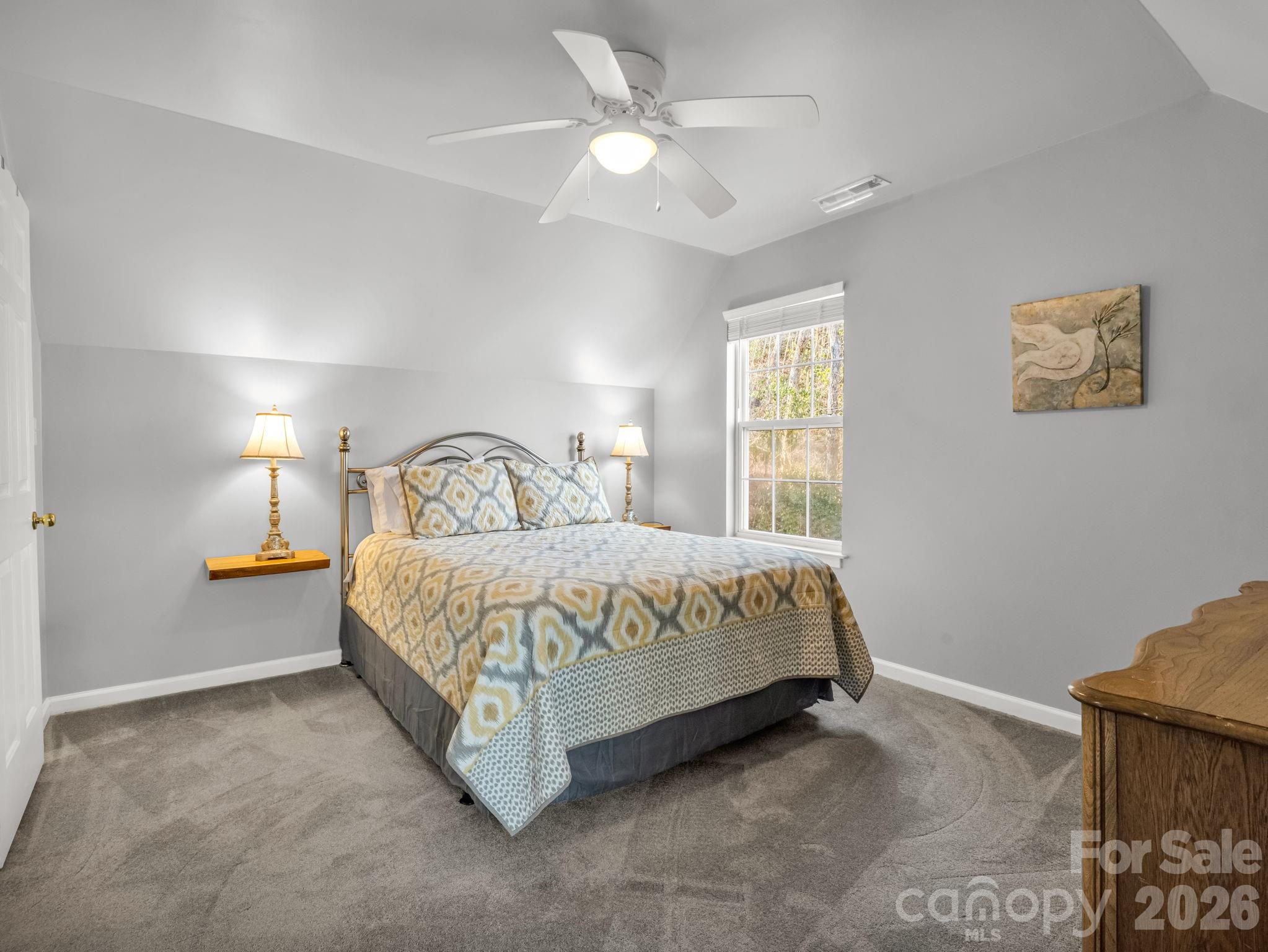 108 Nuthatch Trace Brevard, NC 28712 - Photo 22 of 46 a bedroom with a bed and window