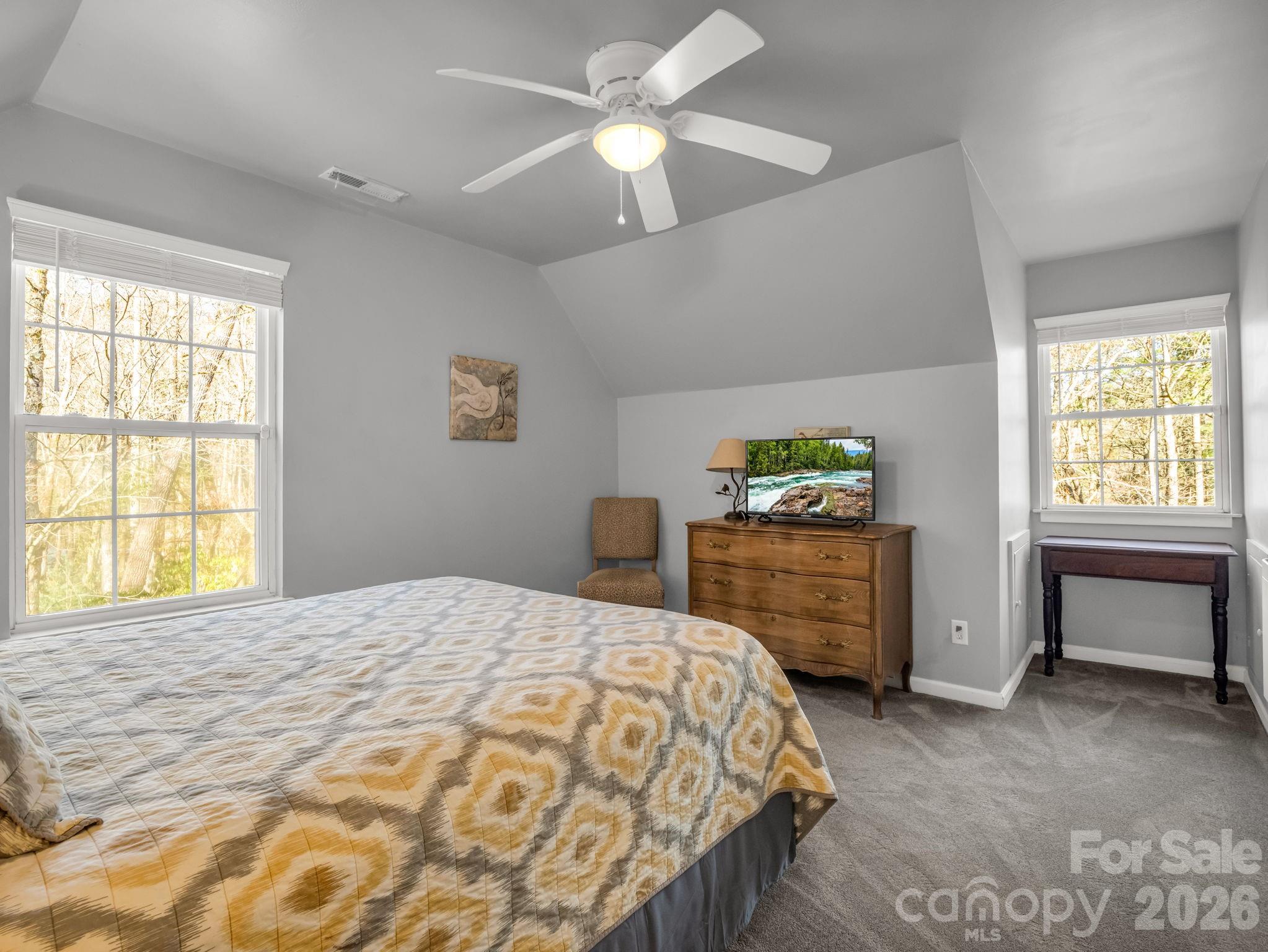 108 Nuthatch Trace Brevard, NC 28712 - Photo 24 of 46 a bedroom with a bed and a window