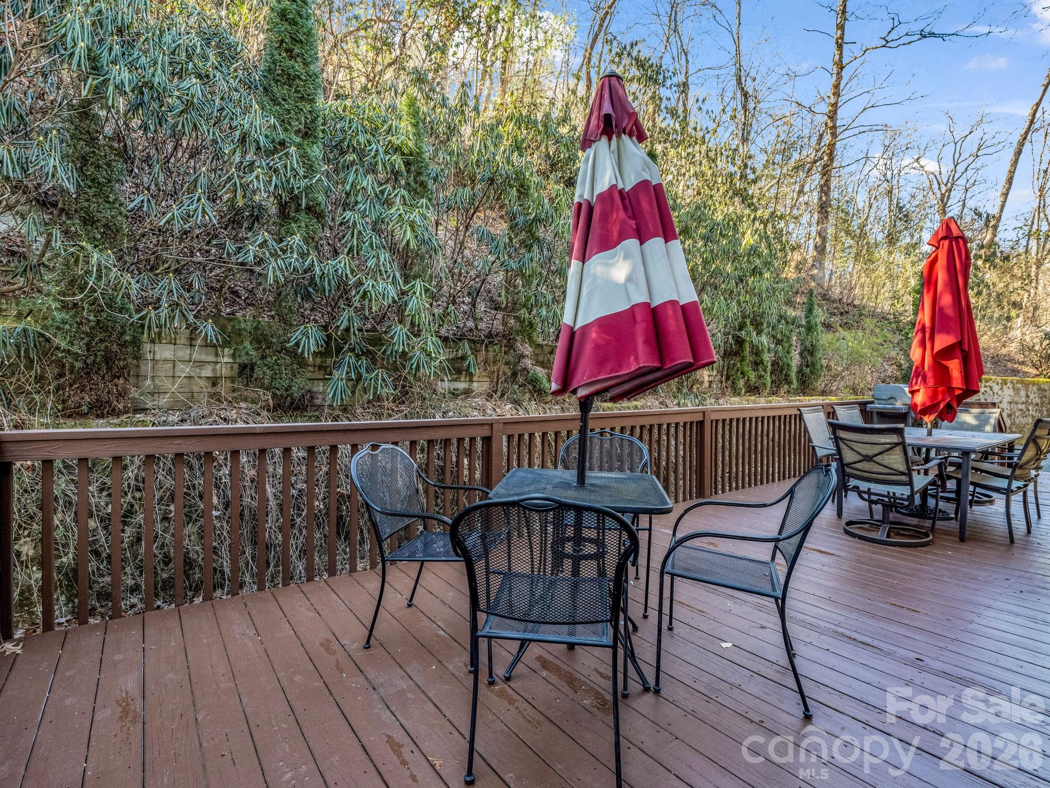 108 Nuthatch Trace Brevard, NC 28712 - Photo 36 of 46 a view of deck with furniture and wooden floor