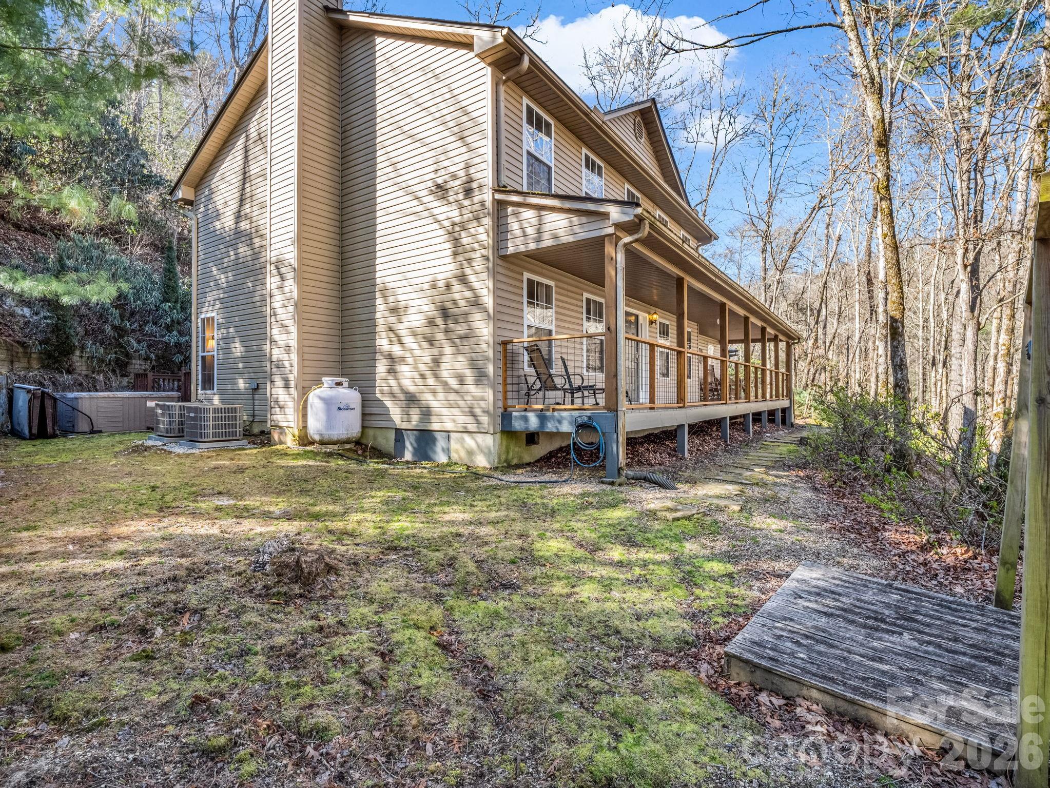 108 Nuthatch Trace Brevard, NC 28712 - Photo 41 of 46 a view of a house with backyard and sitting area