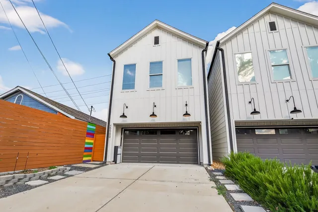 a front view of house with garage