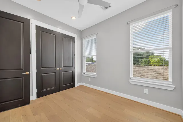 a big room with windows and closet