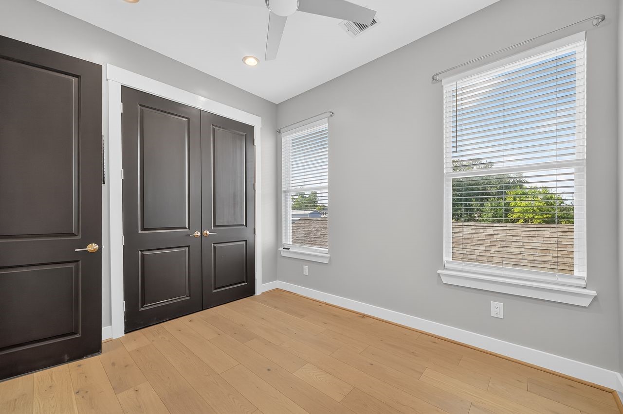 4508 Hardy Street, Unit B Houston, TX 77009 - Photo 20 of 40 a big room with windows and closet