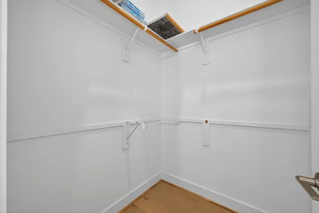 a view of a room with racks on the wall