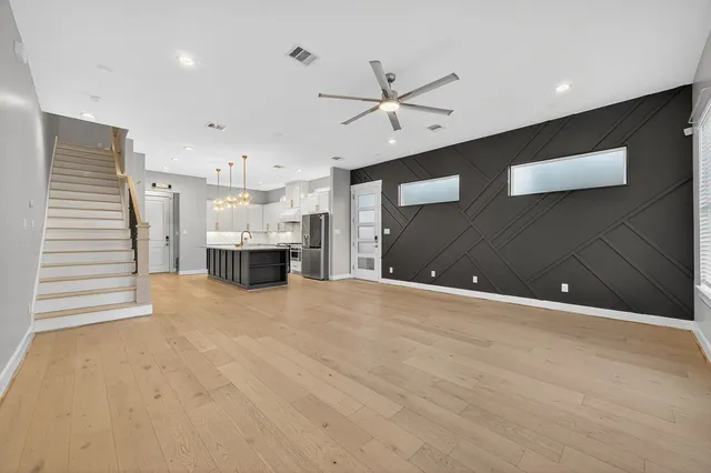 a view of a kitchen with a dishwasher and a cabinets