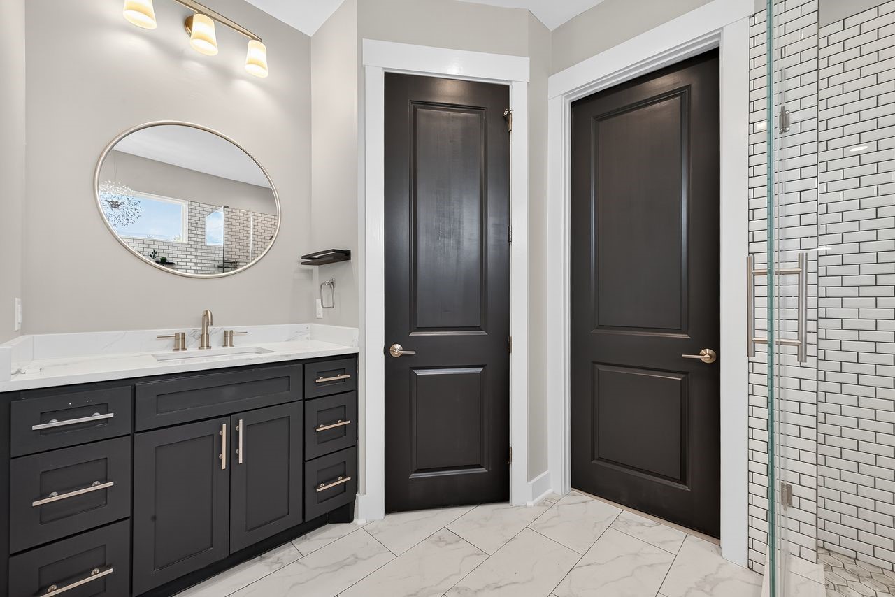 4508 Hardy Street, Unit B Houston, TX 77009 - Photo 32 of 40 a bathroom with a double vanity sink and a mirror
