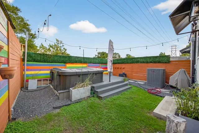 a backyard of a house with seating space