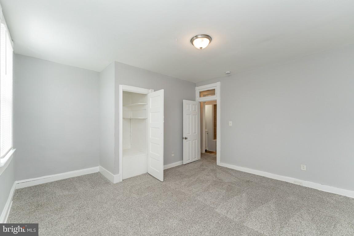 3006 Mathews Street Baltimore, MD 21218 - Photo 14 of 25 an empty room with closet area