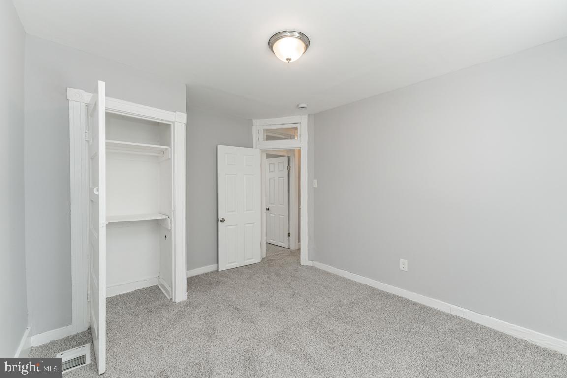 3006 Mathews Street Baltimore, MD 21218 - Photo 19 of 25 a view of an empty room with a closet