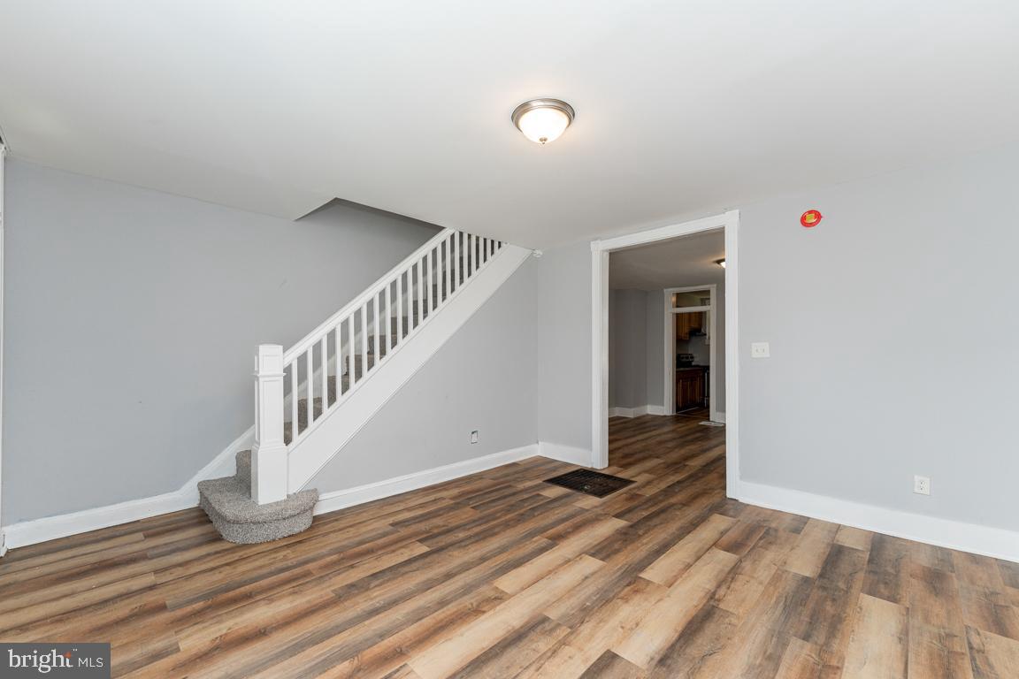 3006 Mathews Street Baltimore, MD 21218 - Photo 5 of 25 a view of an entryway with wooden floor