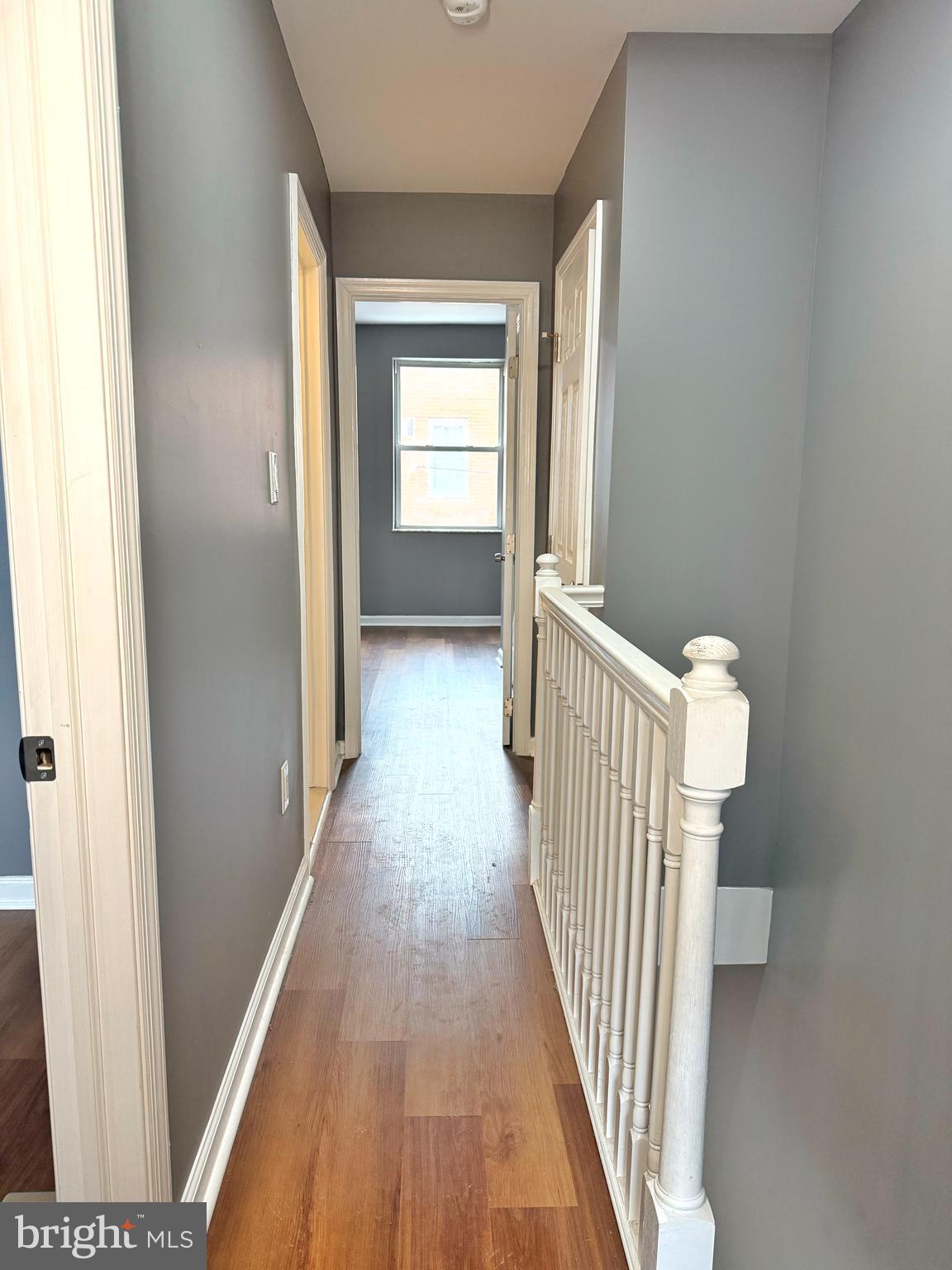 1114 Mercy Street Philadelphia, PA 19148 - Photo 26 of 35 a view of a hallway with wooden floor and closet