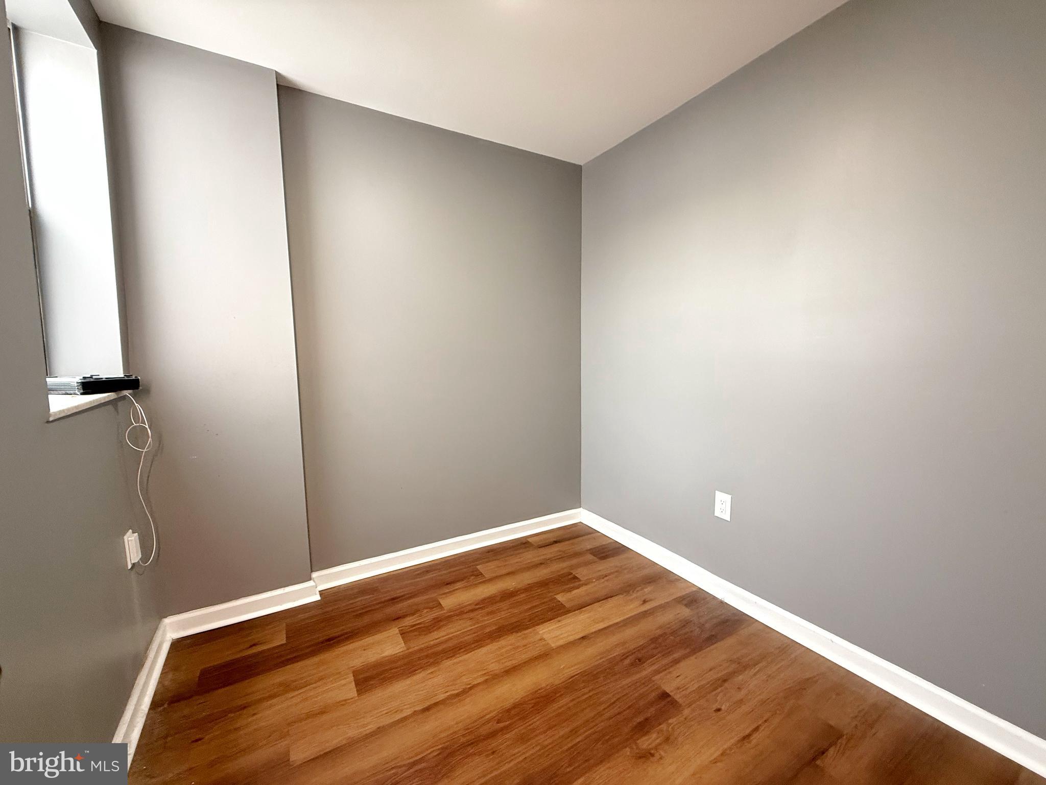 1114 Mercy Street Philadelphia, PA 19148 - Photo 27 of 35 a view of room with wooden floor