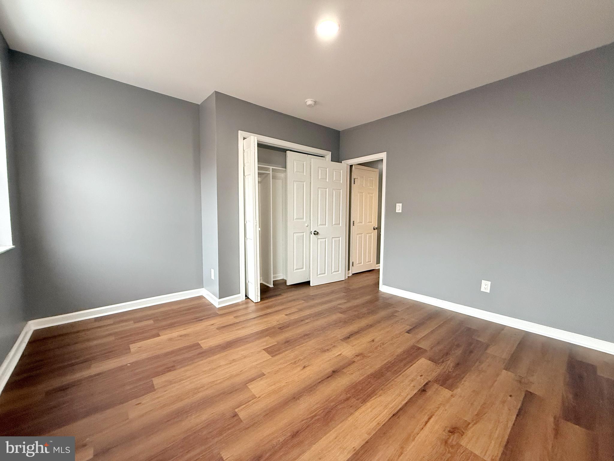1114 Mercy Street Philadelphia, PA 19148 - Photo 30 of 35 a view of an empty room with wooden floor