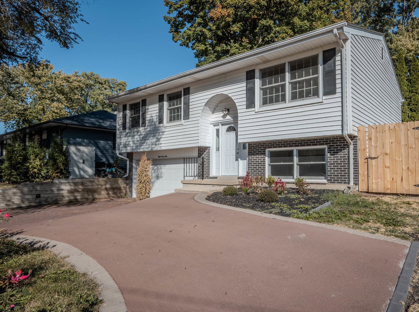 839 North Bennett Street Geneva, IL 60134 - Photo 26 of 33 a front view of a house with a yard and garage