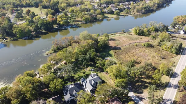 a picture of floor with a white wall and picture