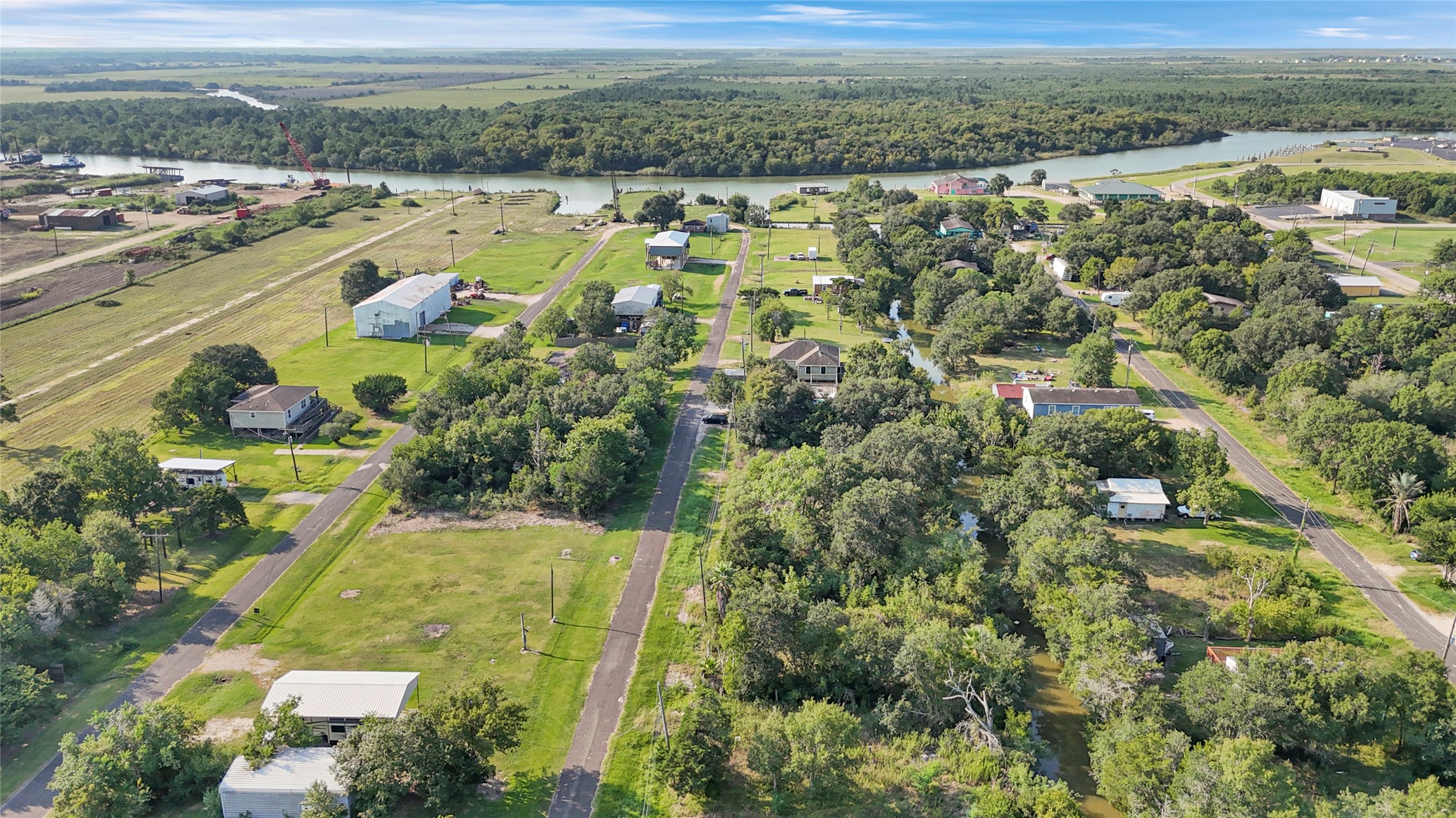 612 Hall Street Anahuac, TX 77514 - Photo 3 of 10 an aerial view of residential houses with outdoor space