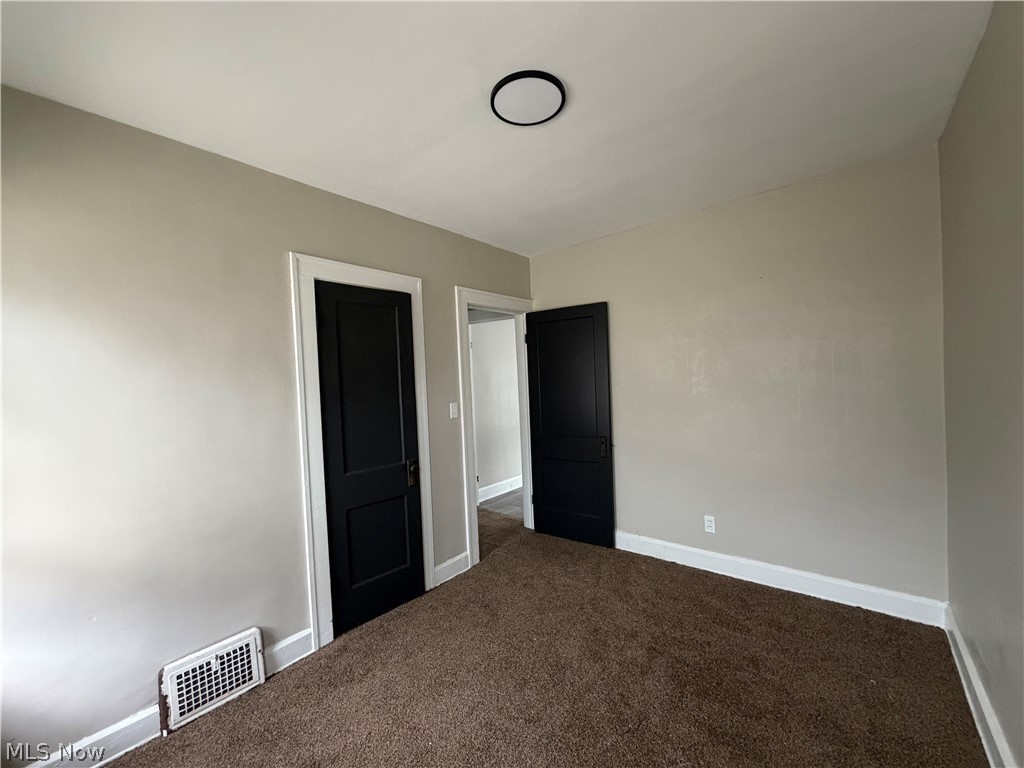 15317 Shiloh Road Cleveland, OH 44110 - Photo 24 of 29 Neutral wall paint with contrasting trim and doors