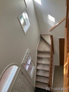 133 South Jackson Street, Unit A6 Denver, CO 80209 - Photo 13 of 19 a view of entryway with stairs and wooden floor