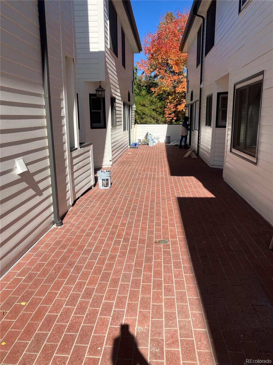 133 South Jackson Street, Unit A6 Denver, CO 80209 - Photo 2 of 19 a view of a backyard with sitting area