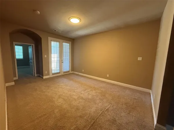 an empty room with windows