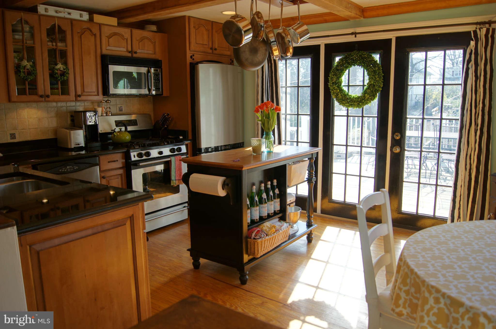 6520 Banbury Road Baltimore, MD 21239 - Photo 13 of 29 Kitchen french doors lead to deck