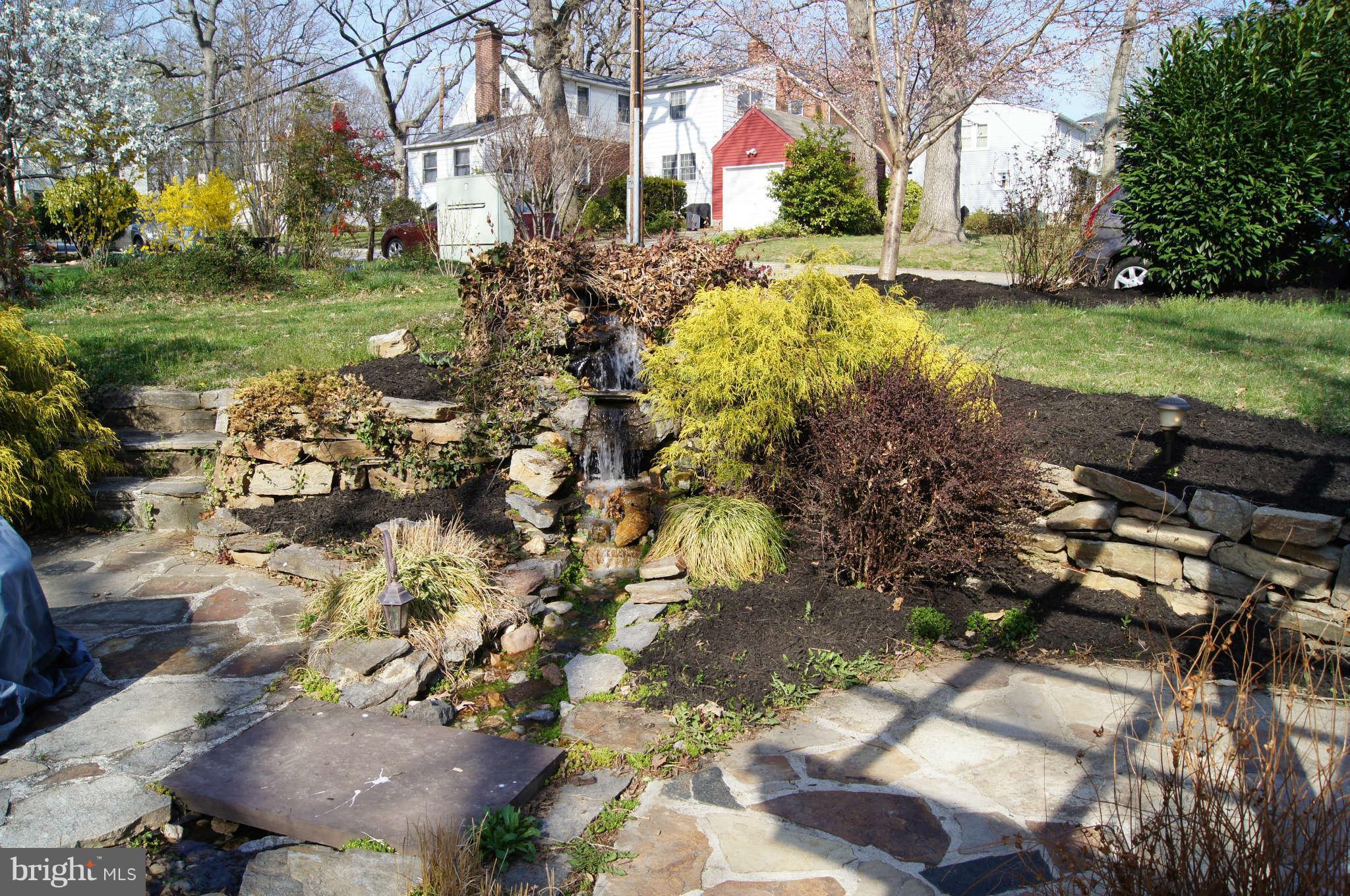 6520 Banbury Road Baltimore, MD 21239 - Photo 3 of 29 waterfall and pond
