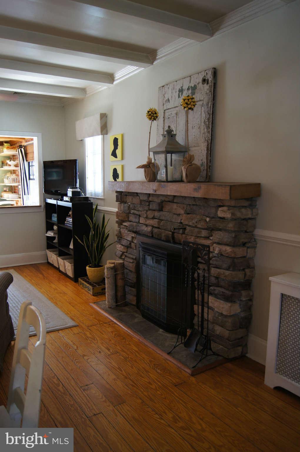 6520 Banbury Road Baltimore, MD 21239 - Photo 8 of 29 Living Room stone fireplace