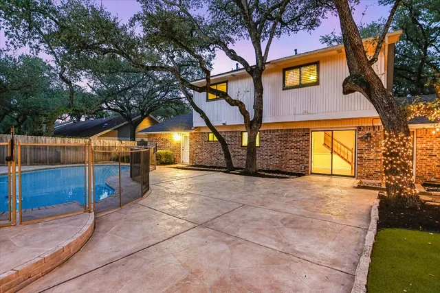 a view of backyard and tree