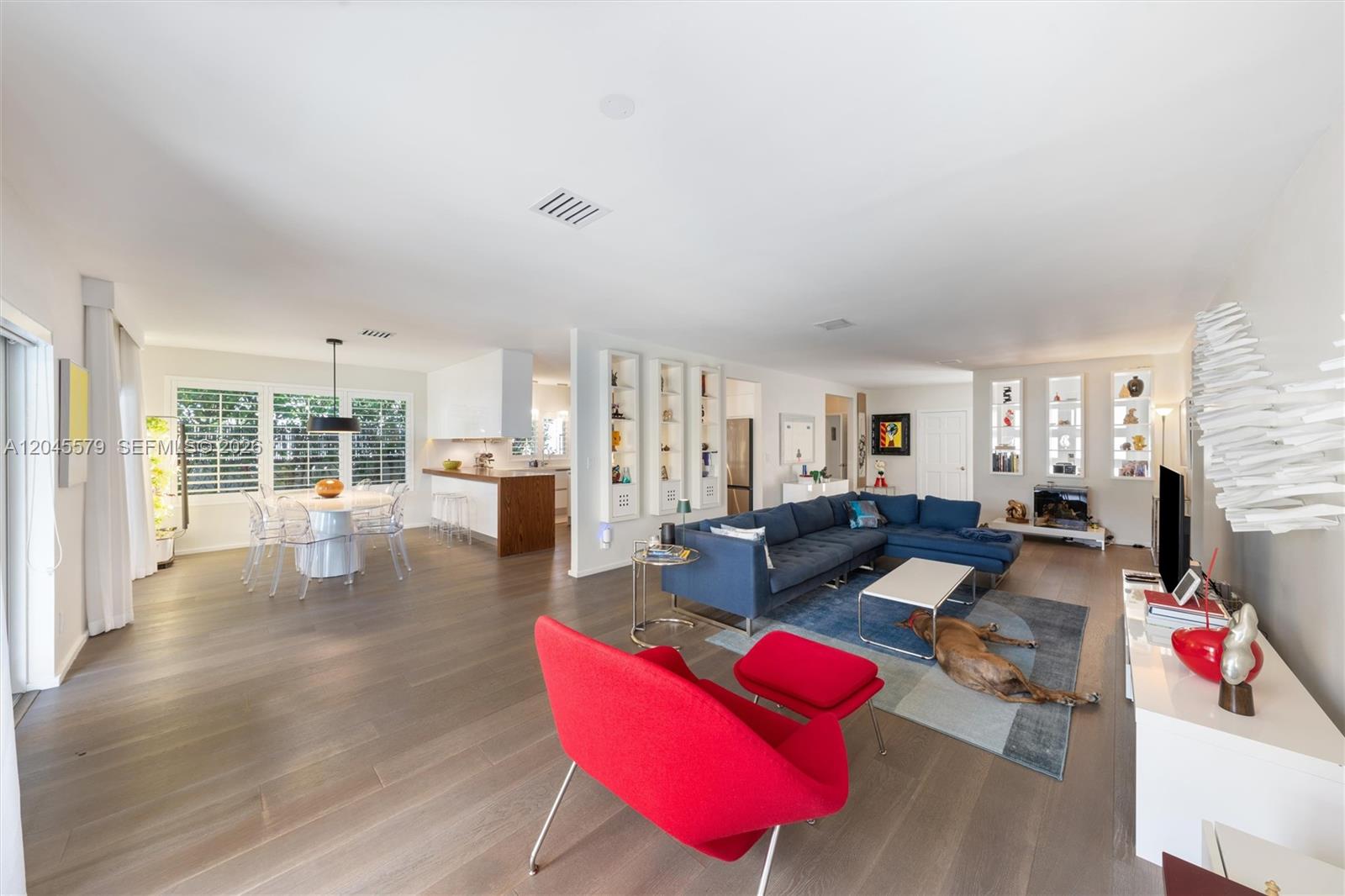12944 Banyan Road North Miami, FL 33181 - Photo 5 of 26 a living room with furniture and a fireplace