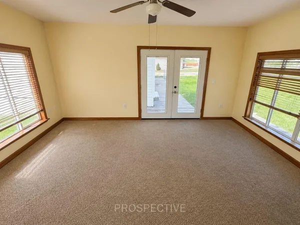 a room with furniture and window