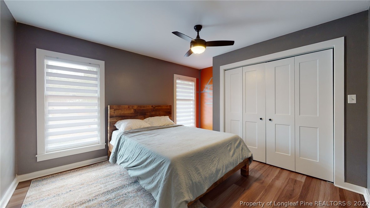 680 Burning Tree Road Pinehurst, NC 28374 - Photo 23 of 43 a bedroom with a large bed and a window